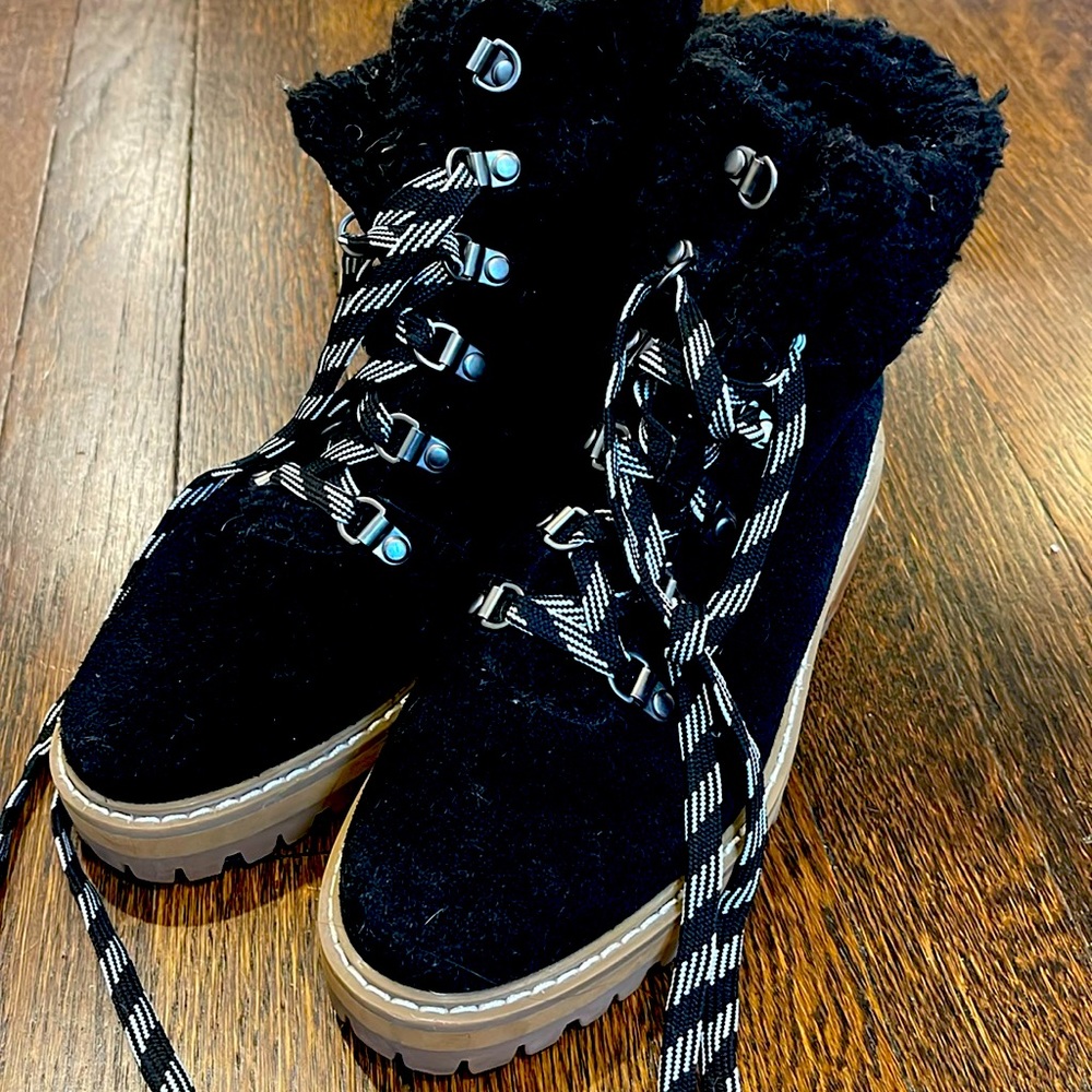 Black shearling combat boots